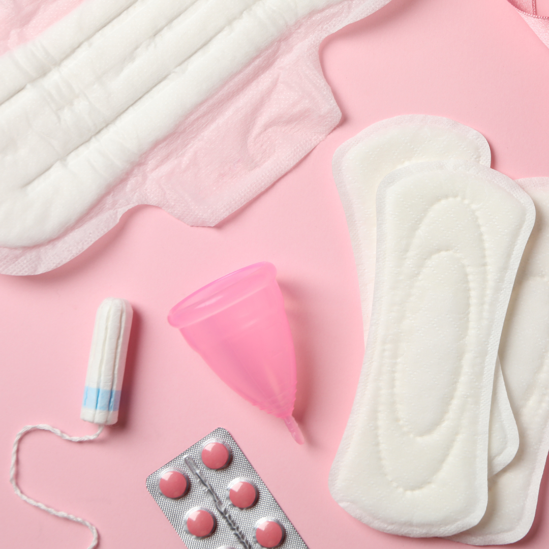 Image of period supplies set against a pink background.