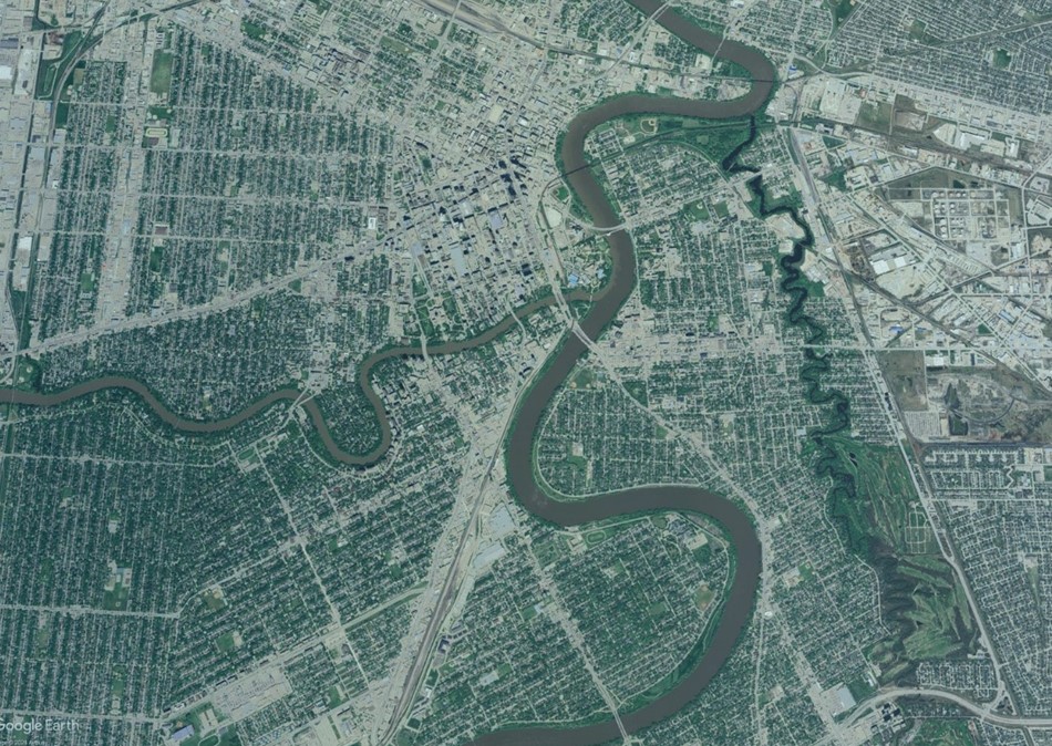 Aerial view of the Forks of the Assiniboine and Red Rivers in Treaty 1 with a green overlay