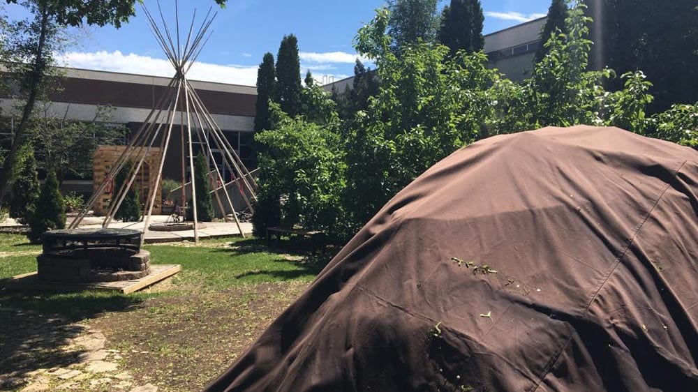 A sweat lodge being built on the grounds of R.B. Russel school in Winnipeg.